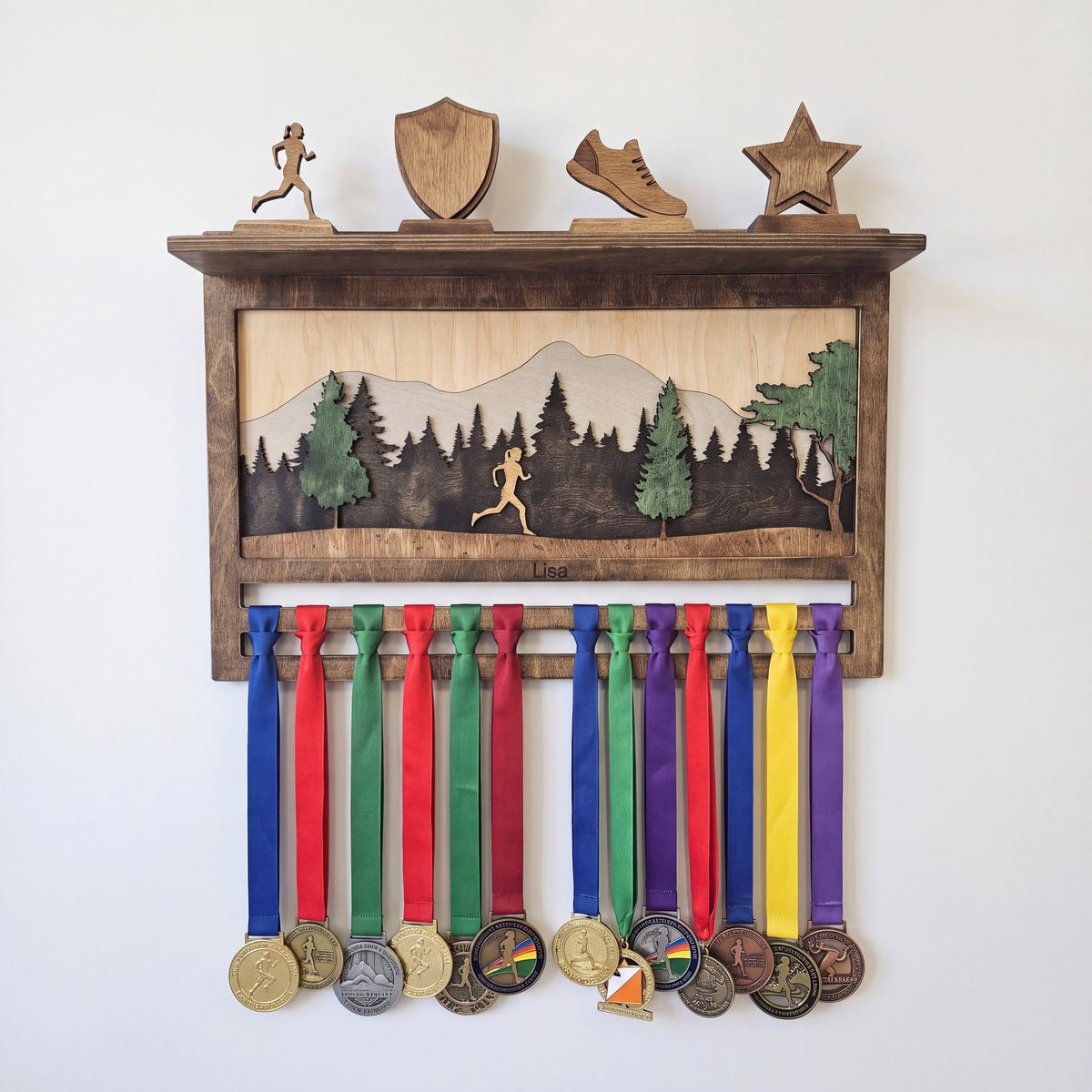 Medal Display with Trophy Shelf — medals hanging on the personalised display | Story of Miles