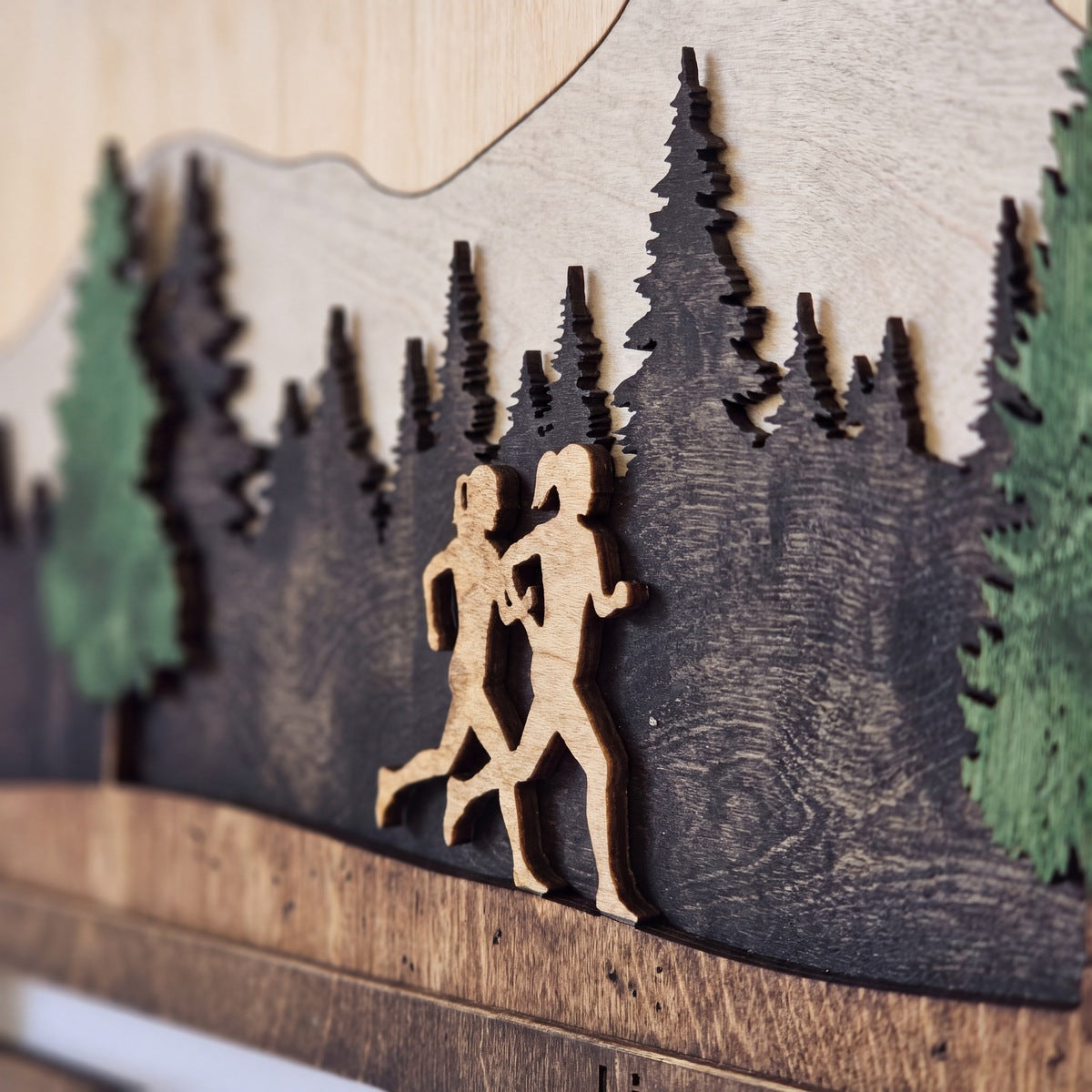 Running Medal Display — layered 3D wood scene detail | Story of Miles