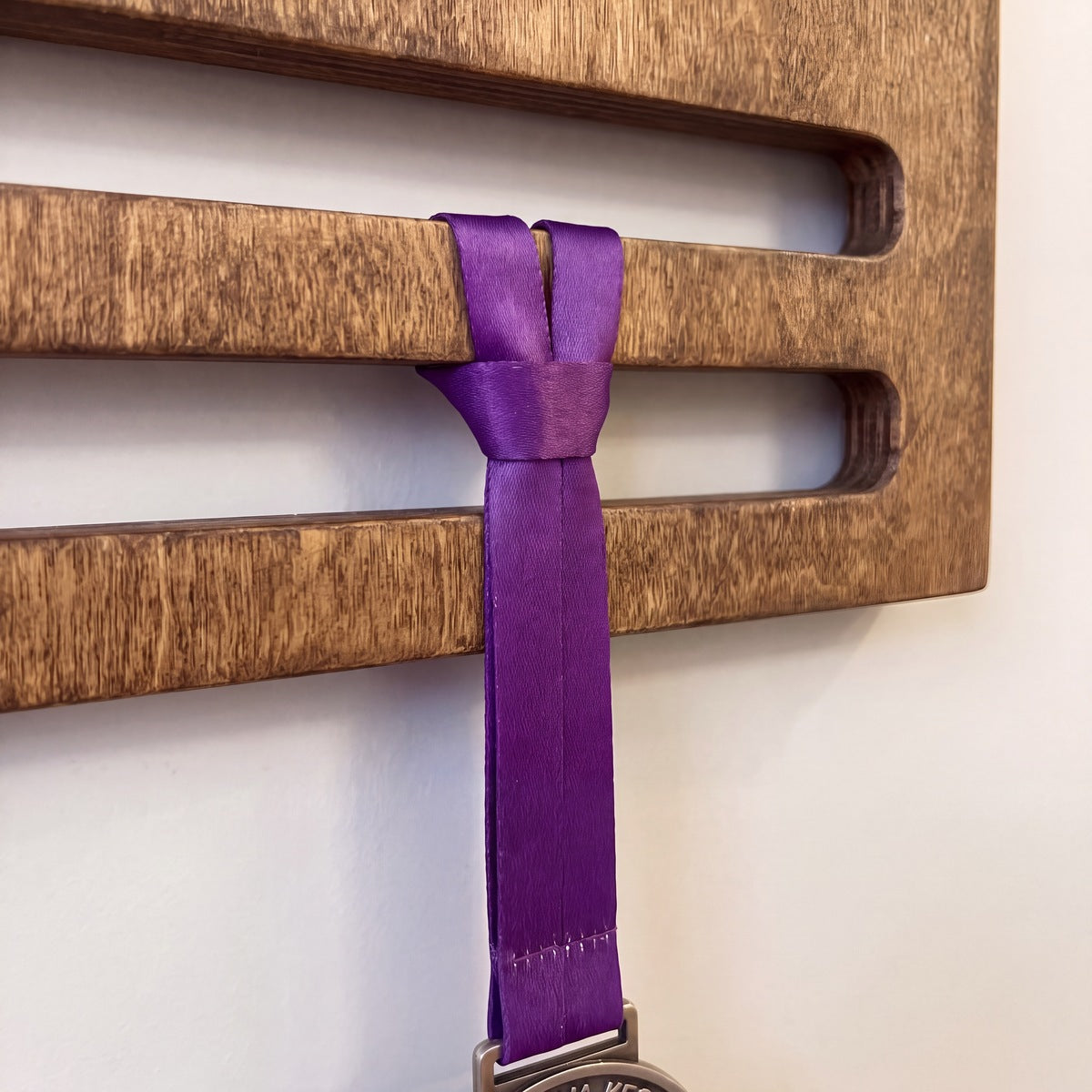 Medal & Bib Display (Big) — medals hanging on the personalised display | Story of Miles