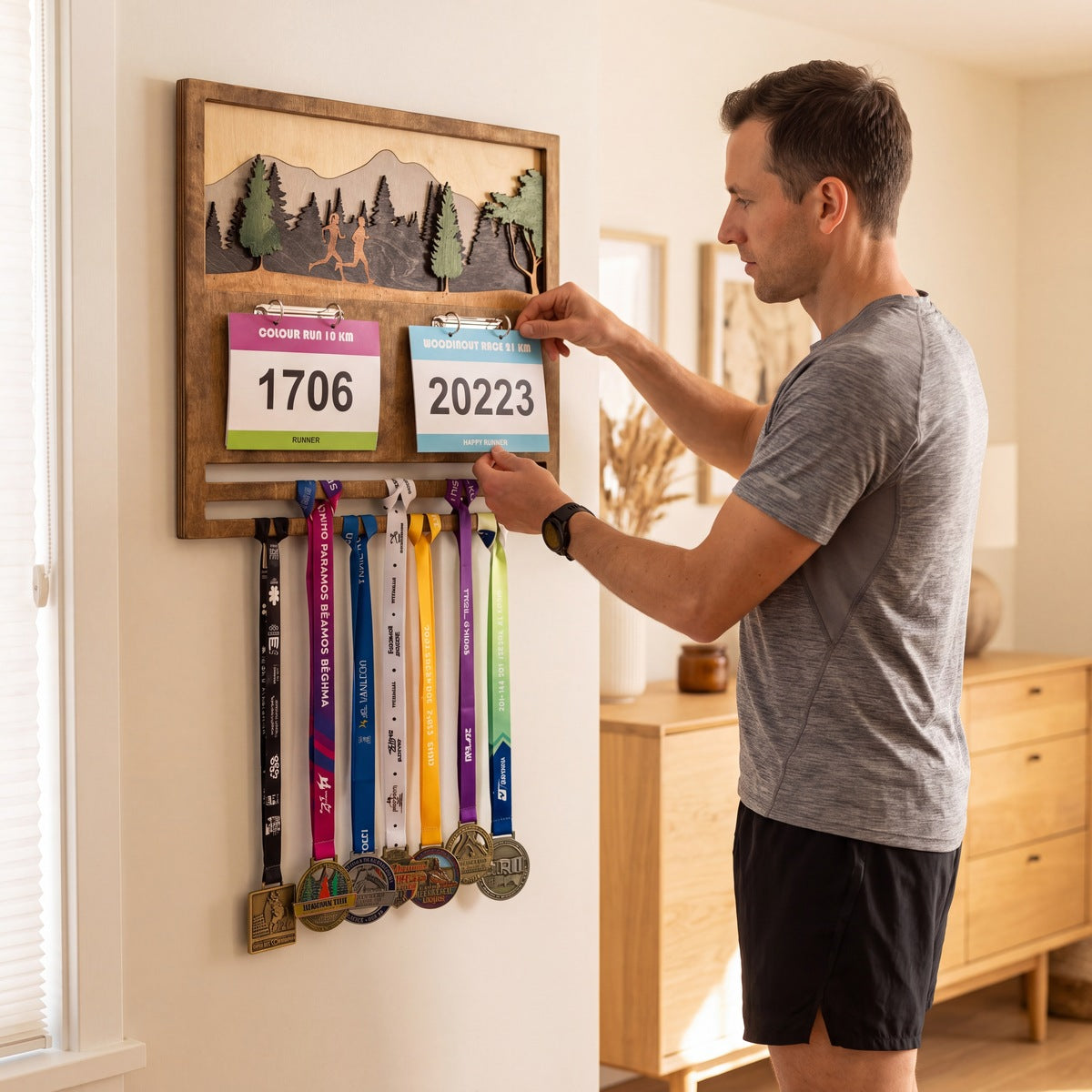 Medal & Bib Display (Big) — close-up of the engraved wooden detail | Story of Miles