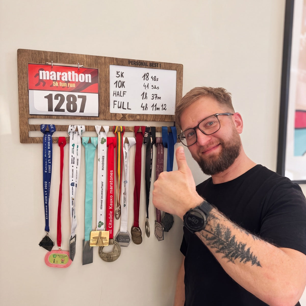 Medal Display with Personal — in a runner's home on the wall | Story of Miles